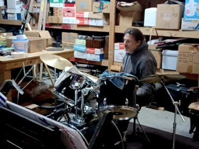 Billy Gold on the drums in the garage